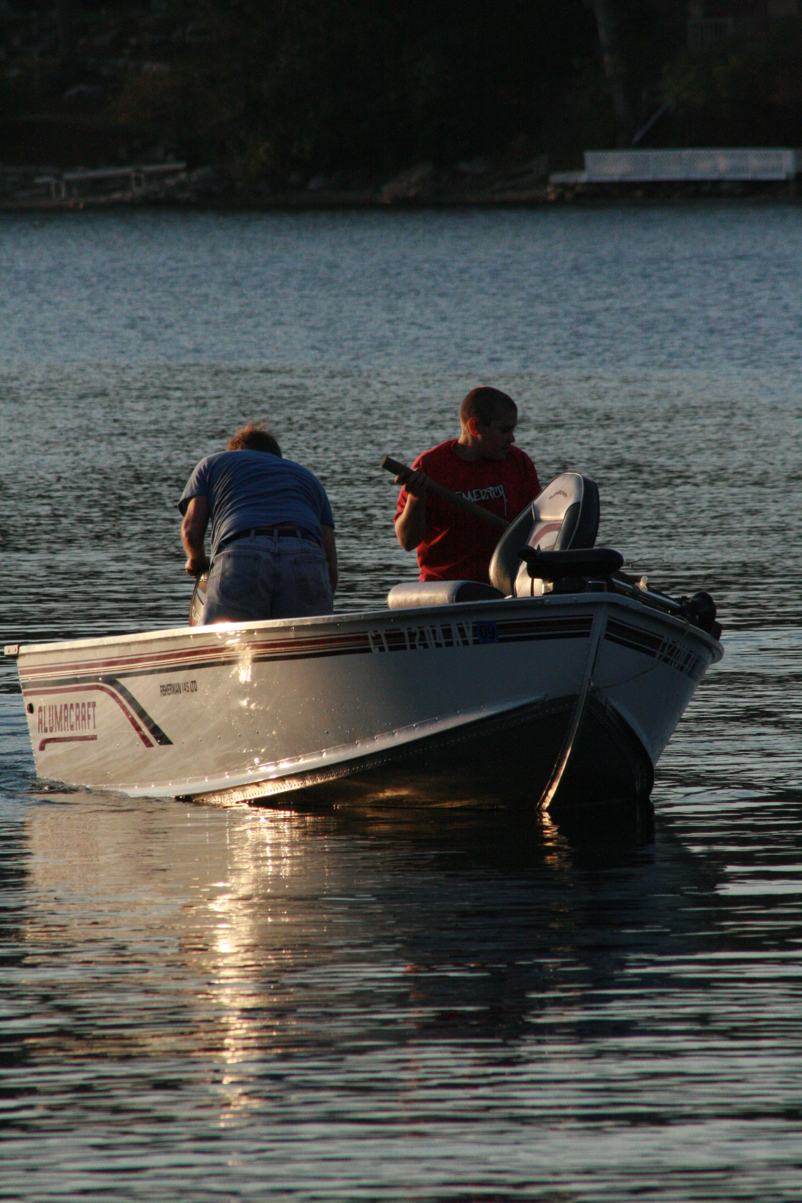 Men boating on the lake