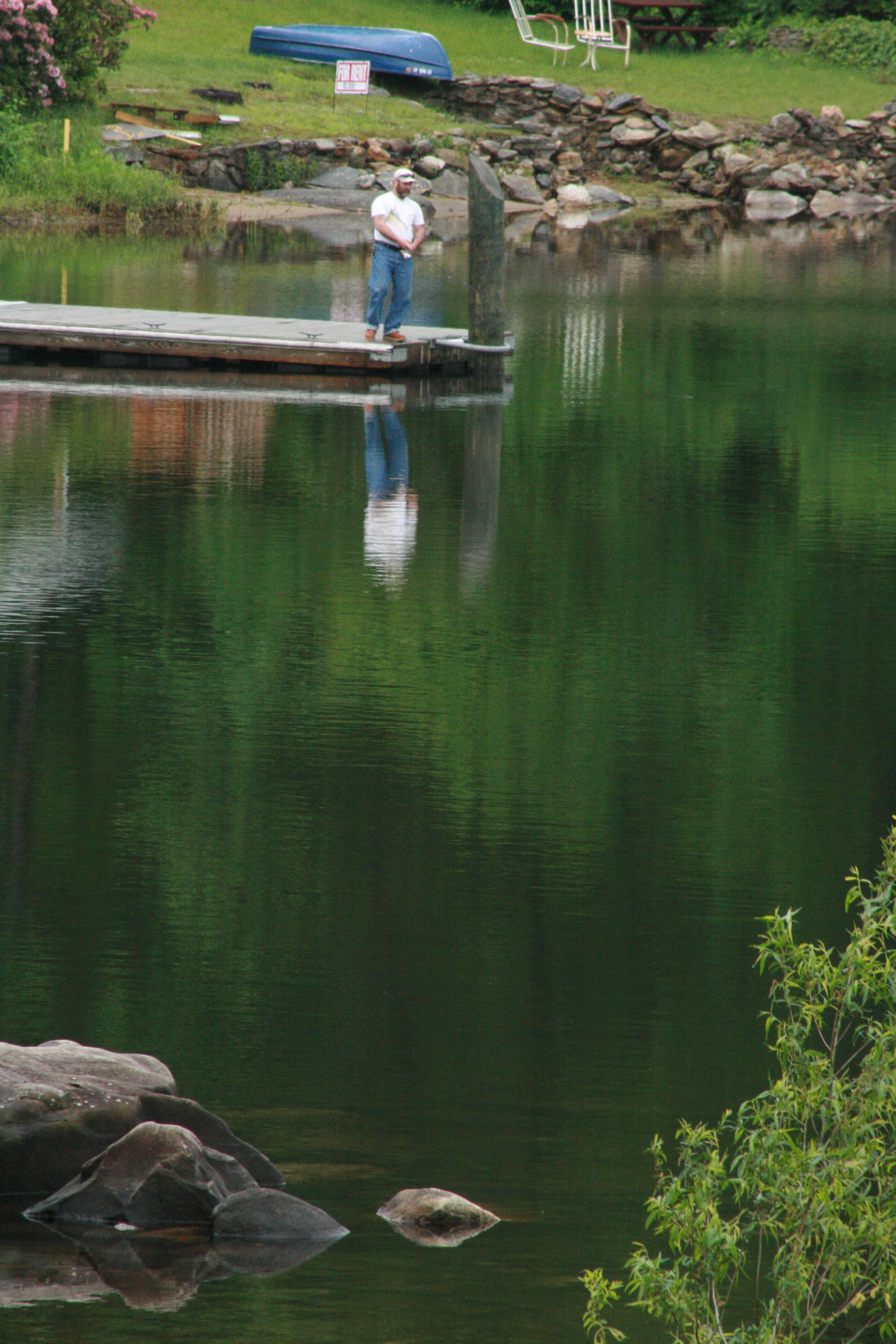 Man fishing off the dock