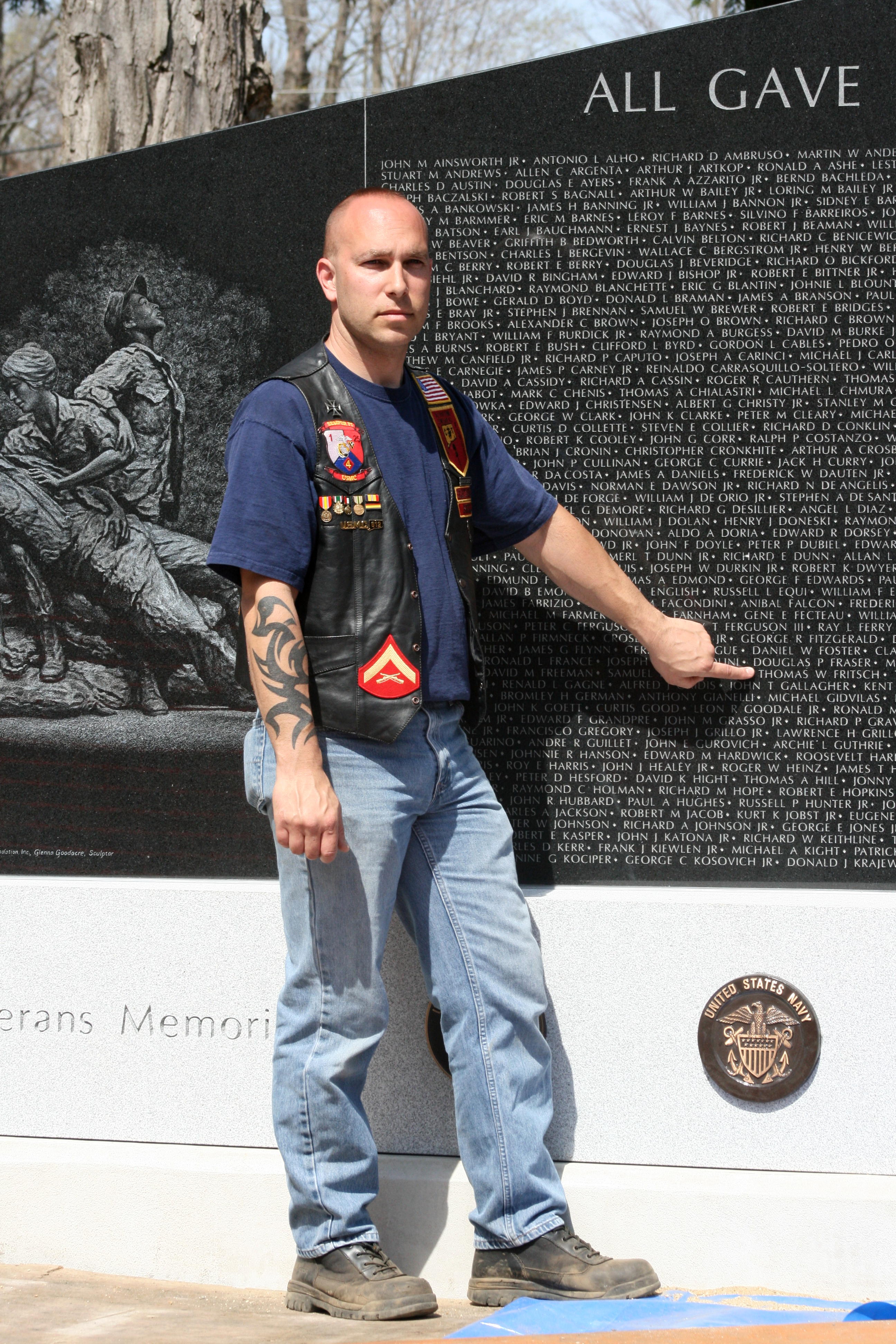 Shawn pointing to his uncle's name