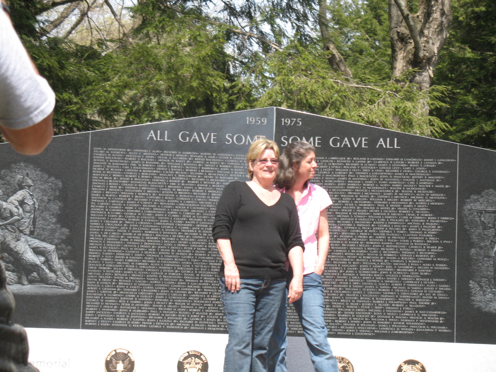 Two women in front of the memorial