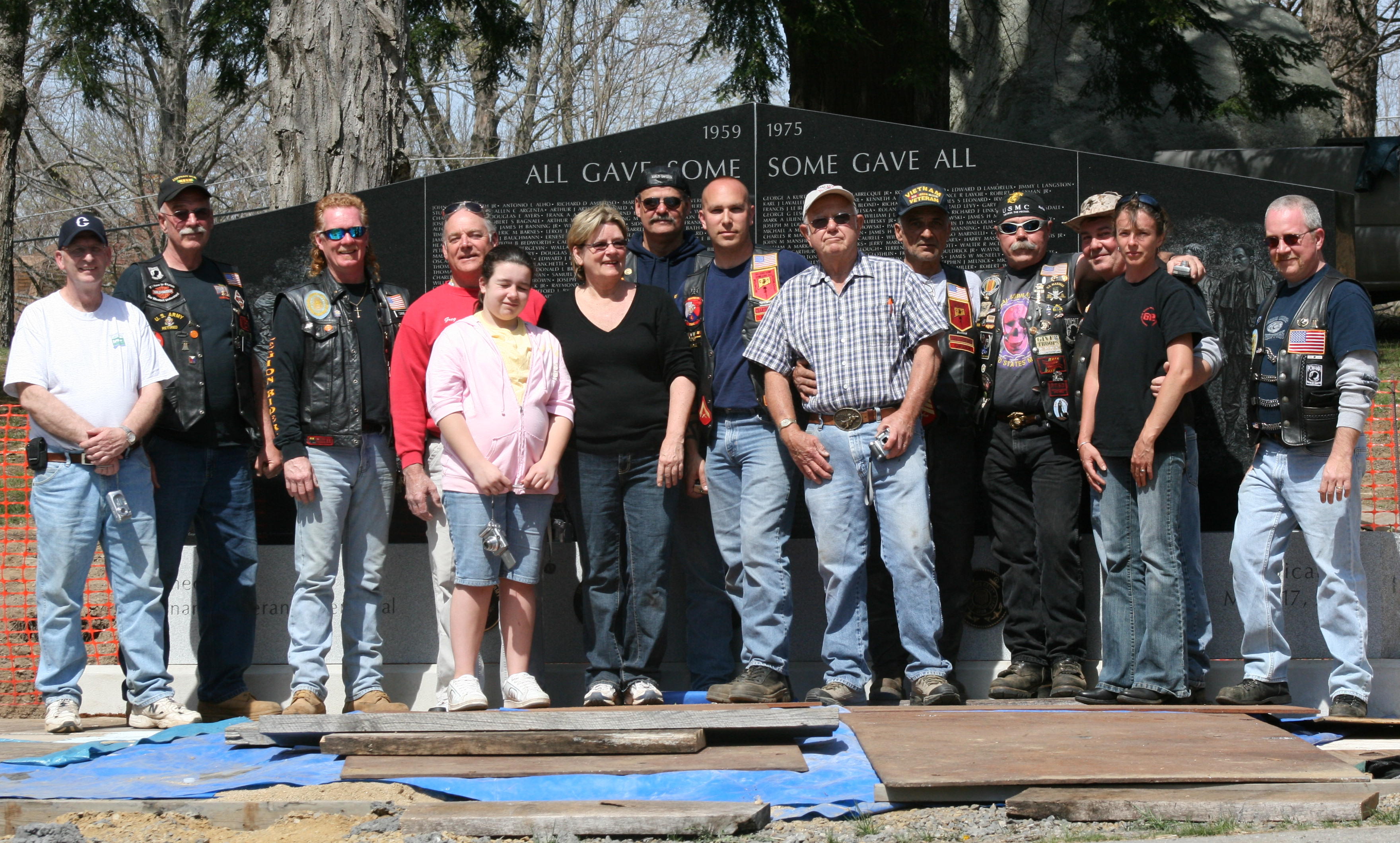 Group in front of memorial
